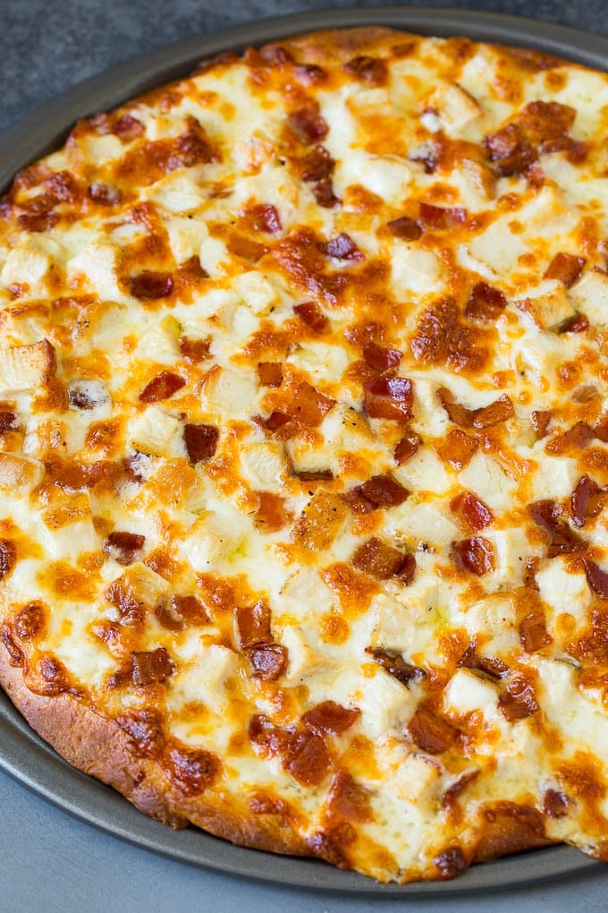 Chicken Alfredo Pizza Recipe #pizza #chicken #bacon #dinner #bajap A baked crust topped with melted cheese and meat.