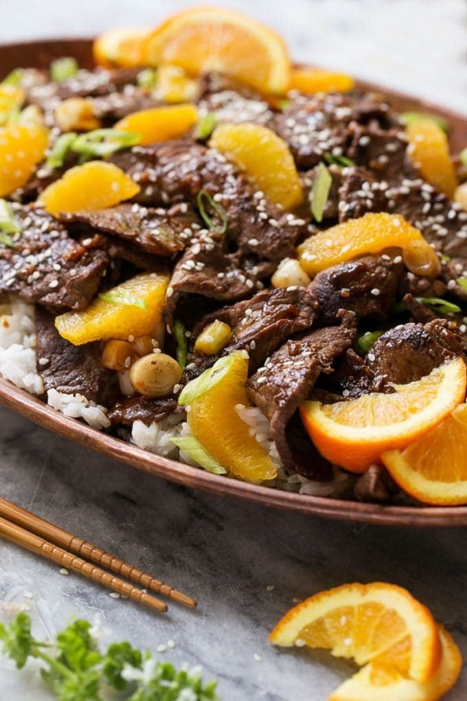 Orange Beef Stir Fry Recipe | 4 Ingredient Orange Beef | Easy Orange Beef #orange #beef #stirfry #asian #dinner #bajap A platter of beef in orange sauce.