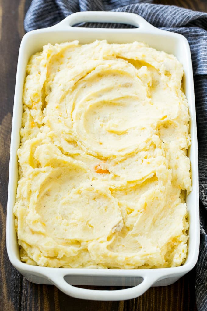 Loaded Mashed Potato Casserole Recipe | Loaded Potatoes | Bacon Mashed Potatoes | Thanksgiving Mashed Potatoes #potatoes #bacon #cheese #casserole #Thanksgiving #dinner #bajap Mashed potatoes in a baking dish.