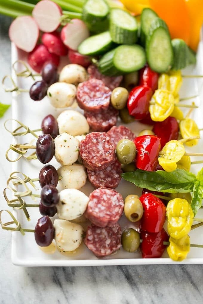 Antipasto Skewers Recipe | Easy Antipasto | Best Antipasto #antipasto #skewers #appetizer #bajap A tray of antipasto kabobs with meat, olives and vegetables.
