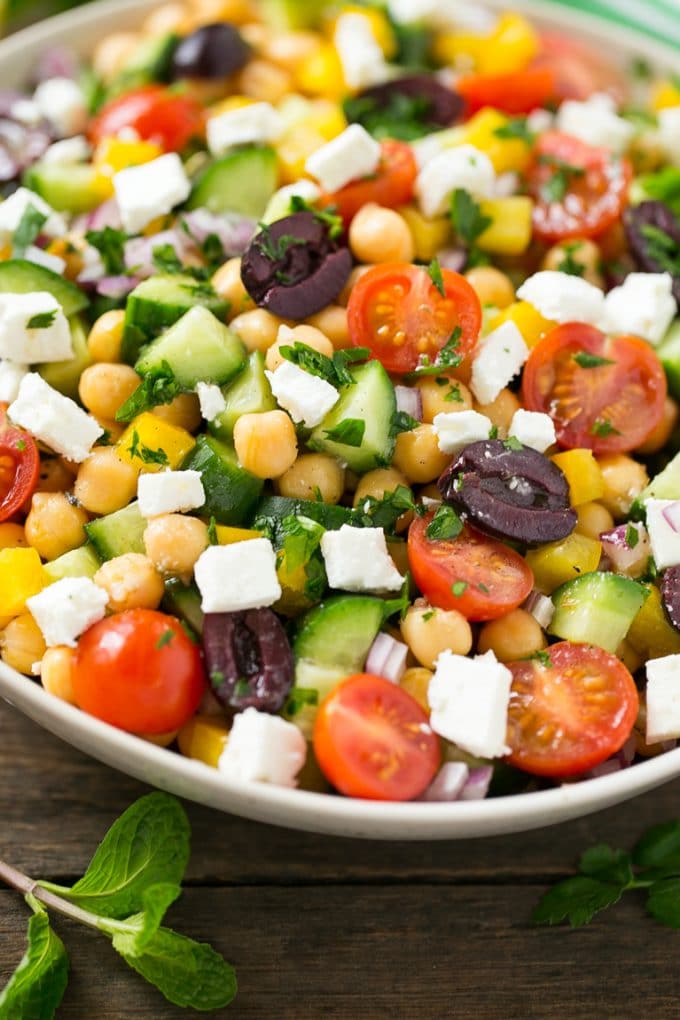 Greek Salad | Chopped Greek salad | Chopped Salad #salad #vegetarian #cheese #chickpeas #lunch #bajap A bowl of Greek salad made with chopped vegetables.