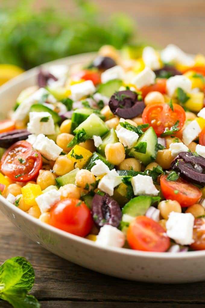 Greek Salad | Chopped Greek salad | Chopped Salad #salad #vegetarian #cheese #chickpeas #lunch #bajap Chopped Greek salad with tomatoes, olives, cucumbers, chickpeas and feta cheese.