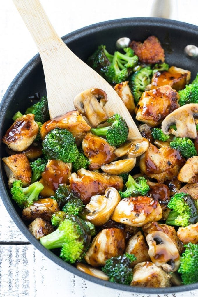 Chicken and Broccoli Stir Fry Recipe | Chicken Stir Fry | Healthy Chicken Recipe | Chicken and Broccoli | Chinese Food #chicken #broccoli #stirfry #healthy #cleaneating #dinner #bajap Chicken and broccoli stir fry with mushrooms in a skillet with a spatula.