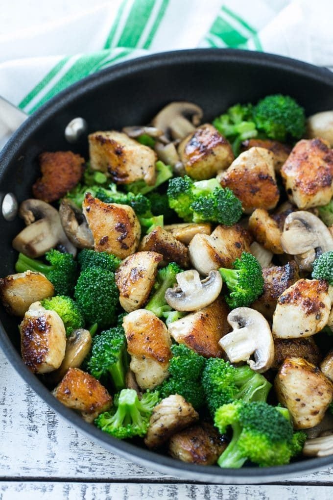 Chicken and Broccoli Stir Fry Recipe | Chicken Stir Fry | Healthy Chicken Recipe | Chicken and Broccoli | Chinese Food #chicken #broccoli #stirfry #healthy #cleaneating #dinner #bajap Sauteed chicken pieces, broccoli florets and mushrooms in a pan.