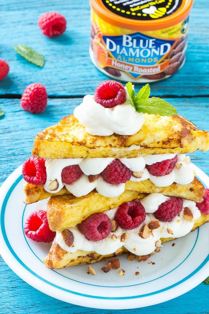 Stuffed French Toast | Cream Cheese Stuffed French Toast | French Toast Recipe #frenchtoast #raspberry #creamcheese #breakfast #brunch #bajap French toast filled with cream cheese and raspberries, then topped with maple syrup.