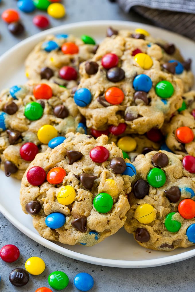 Monster Cookies Recipe | Oatmeal Cookies | Peanut Butter Cookies | M&M's Cookies #baking #cookies #dessert #peanutbutter #chocolate #bajap A plate of monster cookies which are made with oats, peanut butter, chocolate chips and M&M's.