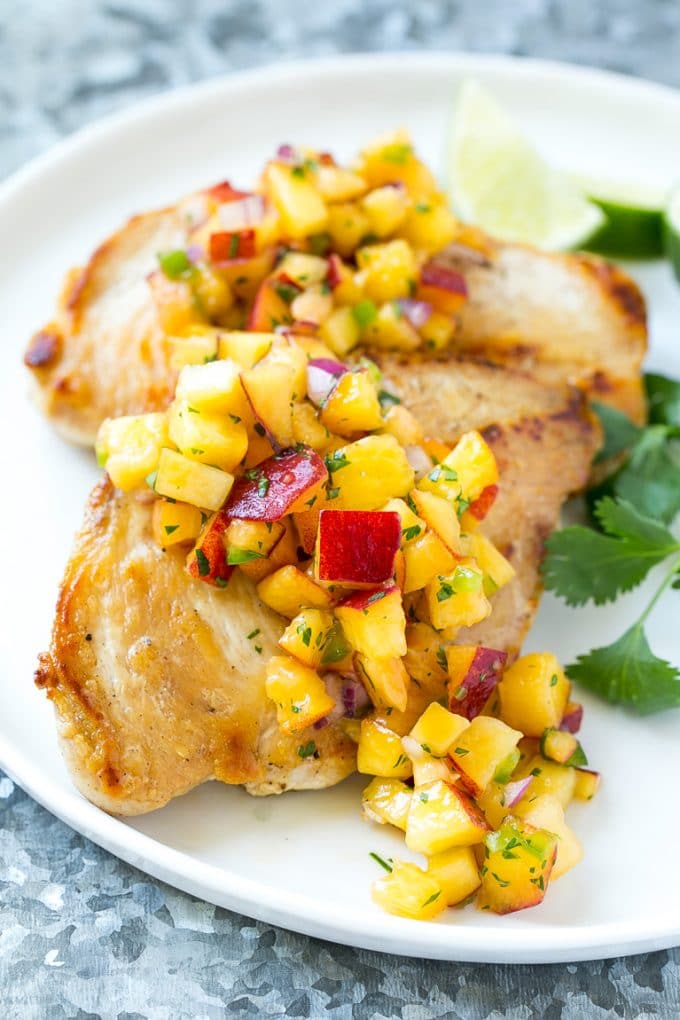 Peach Salsa | Fruit Salsa #peaches #salsa #dip #appetizer #bajap Peach salsa served over grilled chicken breast.
