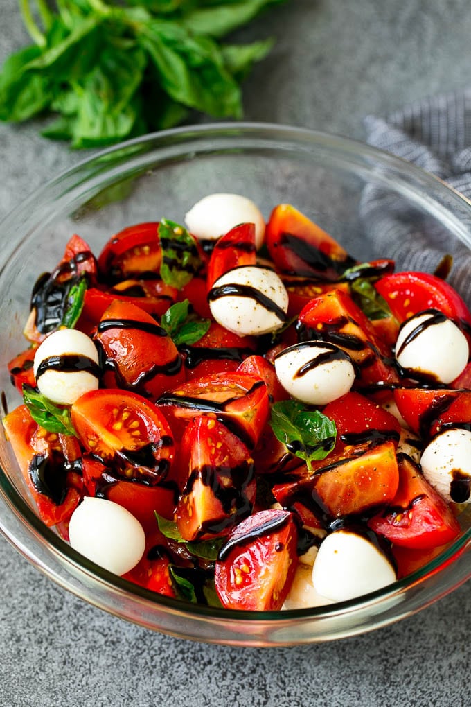 Caprese Salad Recipe | Tomato Salad #salad #tomato #mozzarella #cheese #basil #caprese #summer #bajap Caprese salad with tomatoes, fresh mozzarella, basil leaves and balsamic glaze.