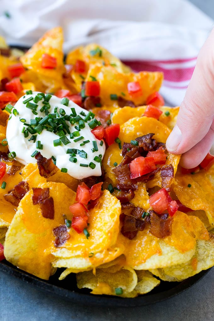 Irish Nachos Recipe | Potato Nachos | Potato Chip Recipe | Appetizer Recipe #nachos #potatoes #cheese #bacon #appetizer #bajap Irish nachos loaded with cheese, bacon, sour cream, tomatoes and chives.