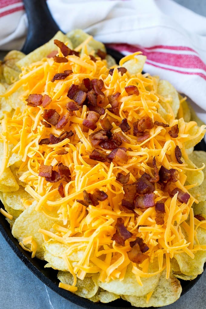 Irish Nachos Recipe | Potato Nachos | Potato Chip Recipe | Appetizer Recipe #nachos #potatoes #cheese #bacon #appetizer #bajap Kettle chips topped with shredded cheese and bacon.