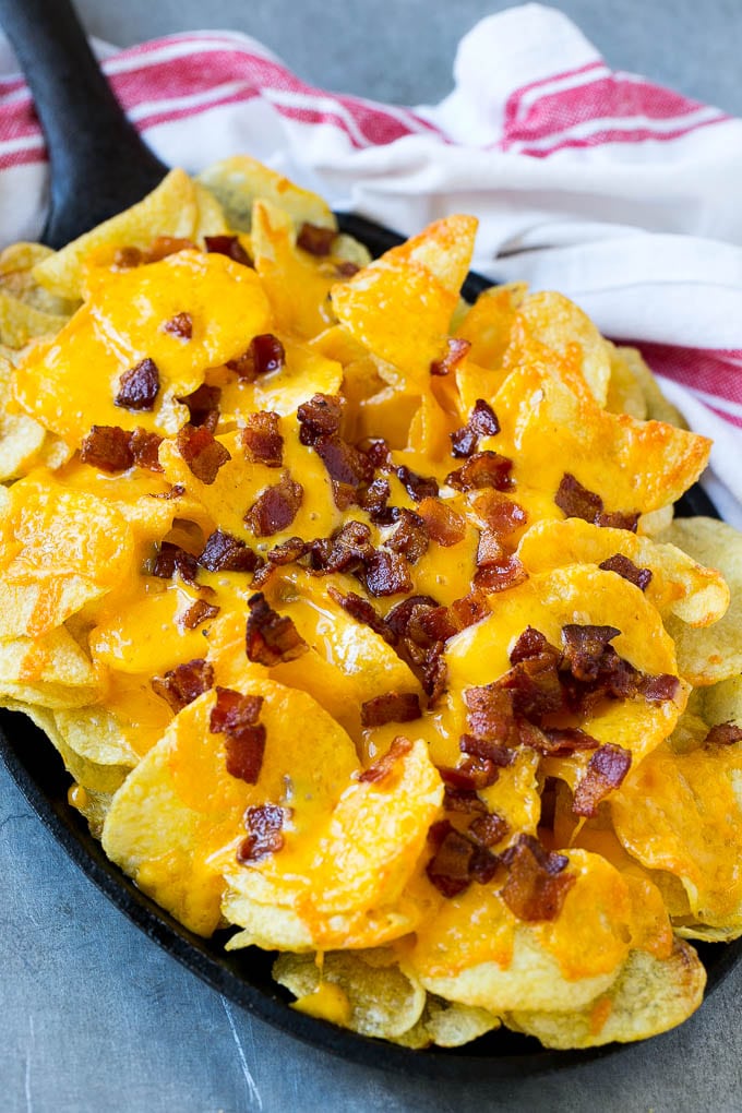 Irish Nachos Recipe | Potato Nachos | Potato Chip Recipe | Appetizer Recipe #nachos #potatoes #cheese #bacon #appetizer #bajap Potato chips topped with melted cheese and bacon.