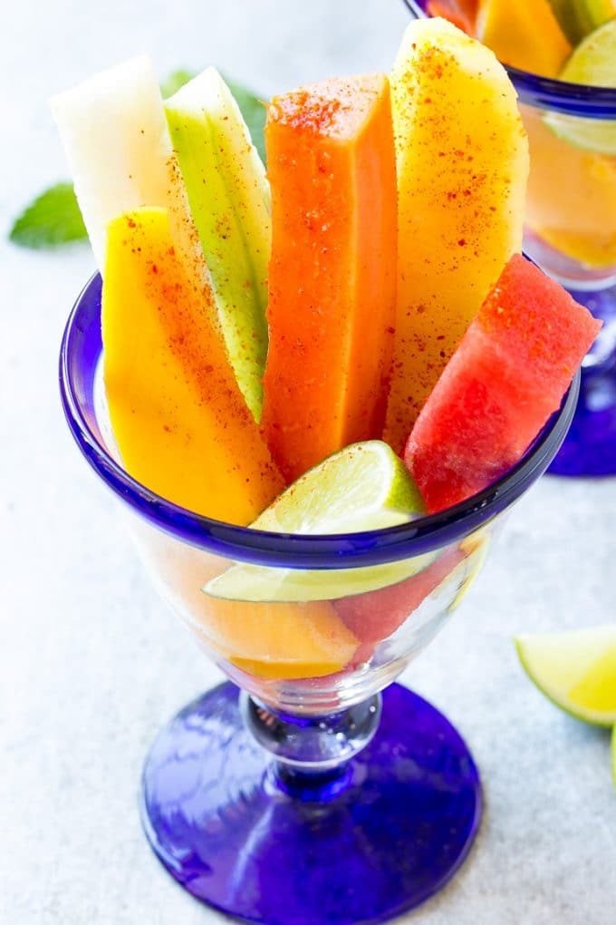 Mexican Fruit Cups | Fruit Cups | Mexican Fruit | Tropical Fruit #fruit #fruitcup #watermelon #pineapple #snack #healthy #bajap Fruit cups filled with watermelon, cucumber, papaya and mango.