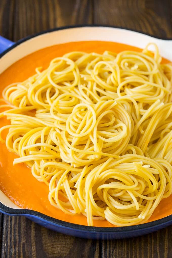 Butternut Squash Pasta Recipe #pasta #squash #bacon #fall #dinner #bajap Spaghetti in a pool of butternut squash sauce.