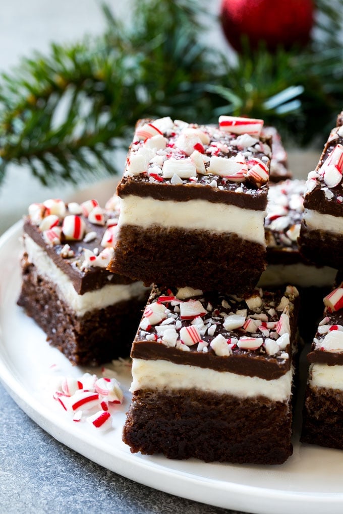 Peppermint Brownies Recipe | Holiday Brownies | Candy Cane Brownies | Mint Brownies #brownies #mint #peppermint #chocolate #dessert #christmas #bajap These easy peppermint brownies on a plate are the perfect holiday treat.