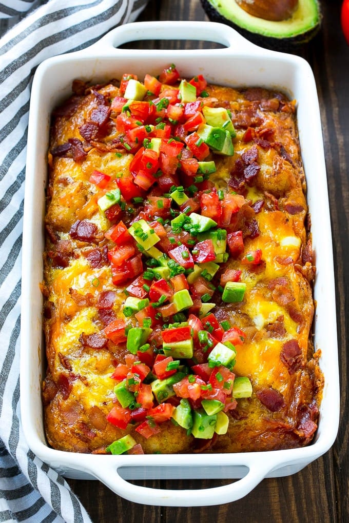 Breakfast Casserole with Bacon Recipe | Bacon and Egg Casserole | Egg Casserole with Bacon | Bacon Breakfast Casserole #eggs #bacon #casserole #breakfast #brunch #bajap A breakfast casserole with bacon that is topped with avocado and tomato.
