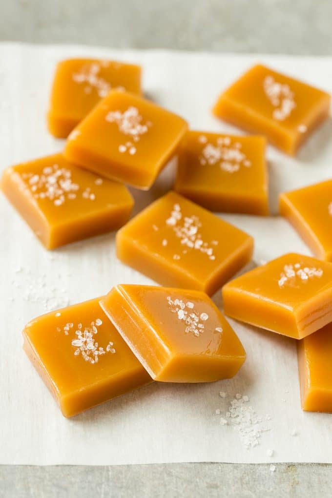 Microwave Caramels with Sea Salt Recipe | Homemade Caramels | Sea Salt Caramel | Homemade Candy #candy #caramels #caramel #microwavecaramels #homemade #dessert #bajap Squares of caramel topped with coarse salt.