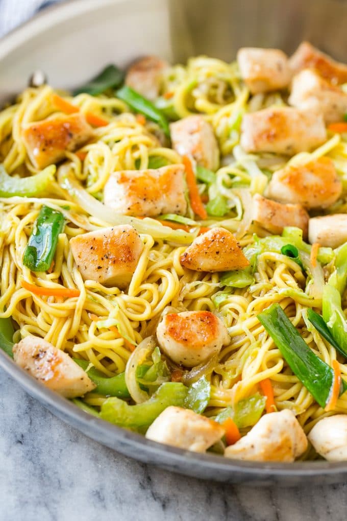 Chicken Chow Mein Recipe | Easy Chicken Recipe | Chow Mein | Chinese Food #chowmein #takeout #asianfood #bajap Chicken chow mein in a skillet with noodles and vegetables.