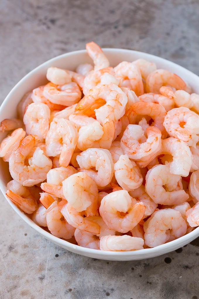 Shrimp Ceviche Recipe | Mexican Shrimp | Marinated Shrimp #shrimp #ceviche #cleaneating #healthy #lowcarb #keto #glutenfree #dinner #appetizer #bajap Cooked prawns in a serving bowl.