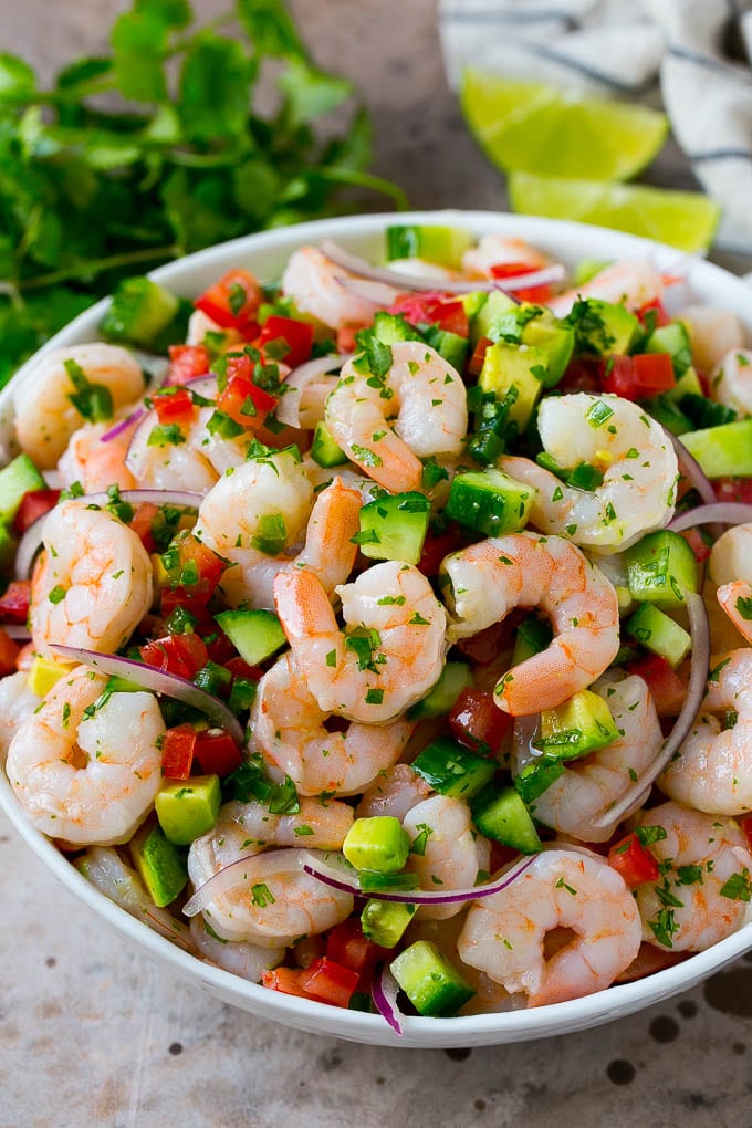 Shrimp Ceviche Recipe | Mexican Shrimp | Marinated Shrimp #shrimp #ceviche #cleaneating #healthy #lowcarb #keto #glutenfree #dinner #appetizer #bajap A bowl of shrimp ceviche marinated in citrus juice with tomato, avocado, cilantro and jalapeno.