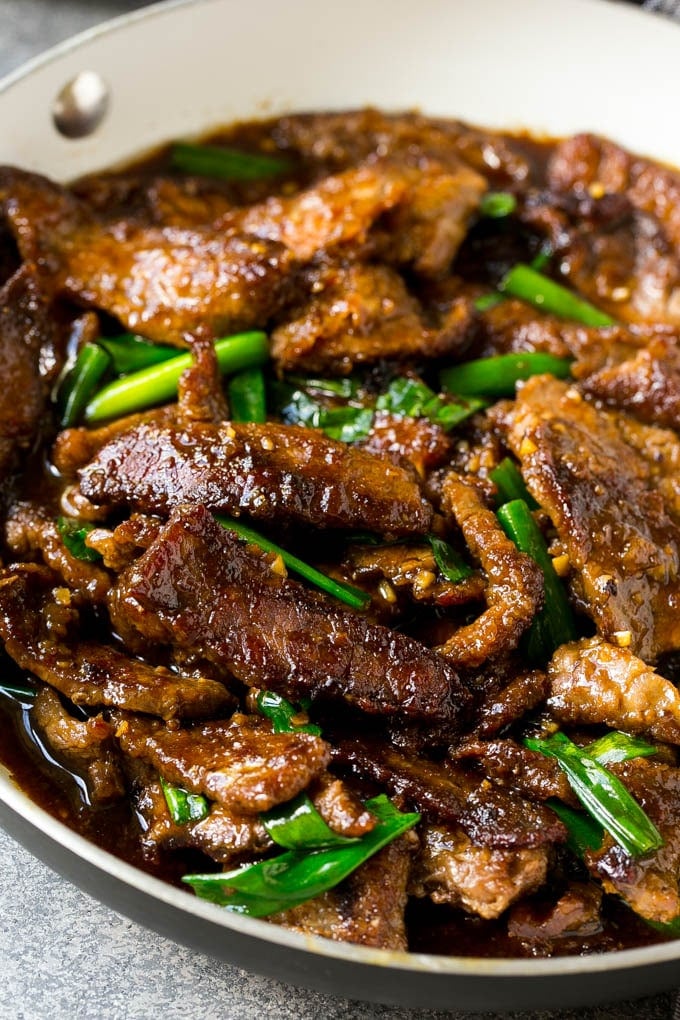 Mongolian Beef Recipe | Asian Beef Recipe | Chinese Beef | Beef Stir Fry #Chinese #Mongolian #Asian #mongolianbeef #beef #bajap #dinner A pan full of Mongolian beef with green onions.