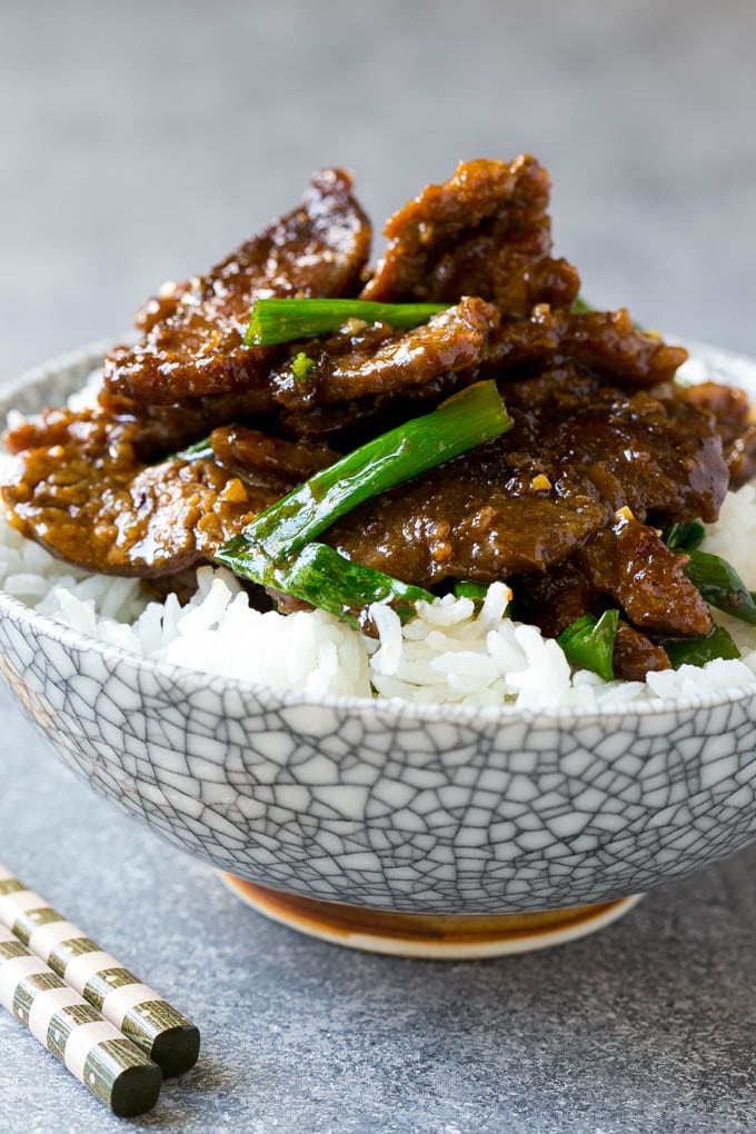 Mongolian Beef Recipe | Asian Beef Recipe | Chinese Beef | Beef Stir Fry #Chinese #Mongolian #Asian #mongolianbeef #beef #bajap #dinner A bowl of mongolian beef over rice.