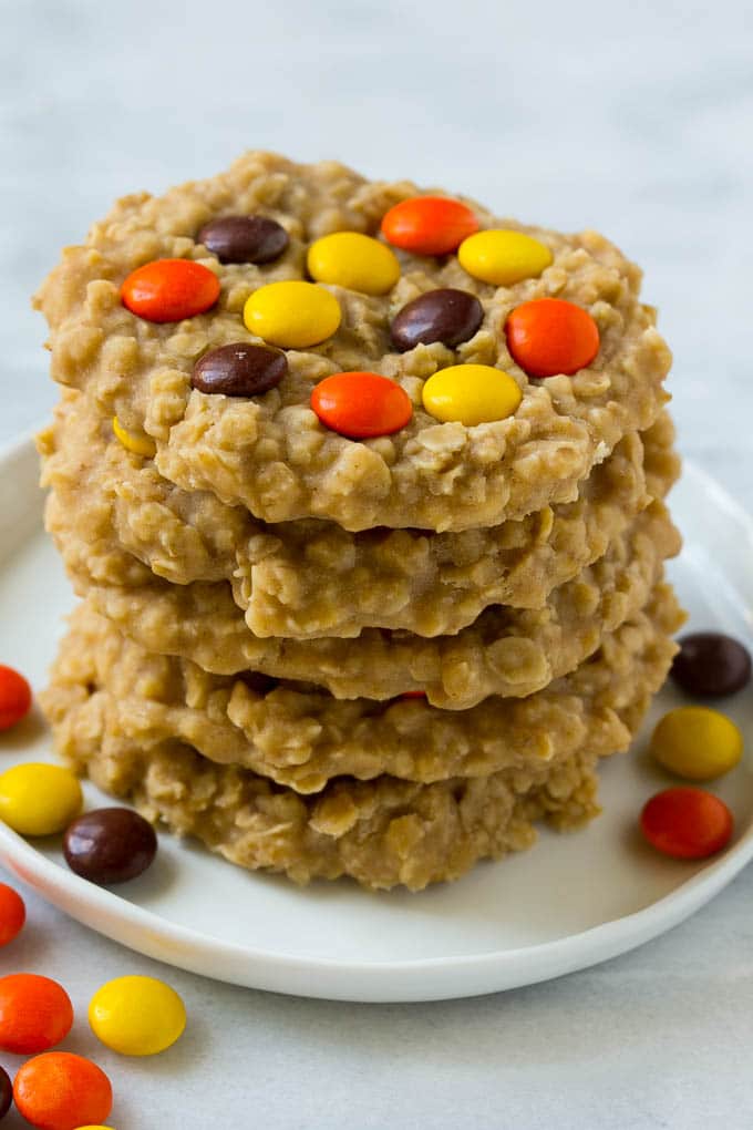 No Bake Peanut Butter Cookies Recipe | No Bake Cookies | Peanut Butter Cookies #peanutbutter #cookies #nobake #nobakecookies #peanutbuttercookies #dessert #bajap A plate with a stack of no bake peanut butter cookies.