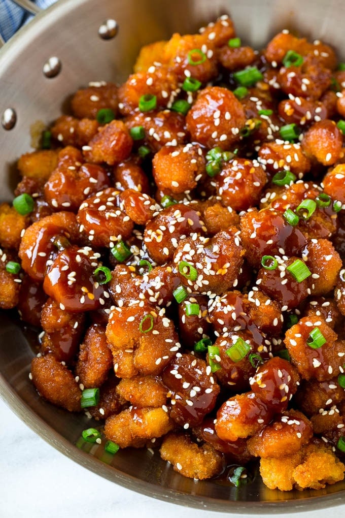 Sesame Shrimp Recipe | Crispy Shrimp | Popcorn Shrimp | Asian Shrimp | Easy Shrimp Recipe #shrimp #fried #friedshrimp #sesameshrimp #crispy #popcornshrimp #chinese #asian #dinner #bajap A pan of popcorn shrimp in an Asian sesame sauce.