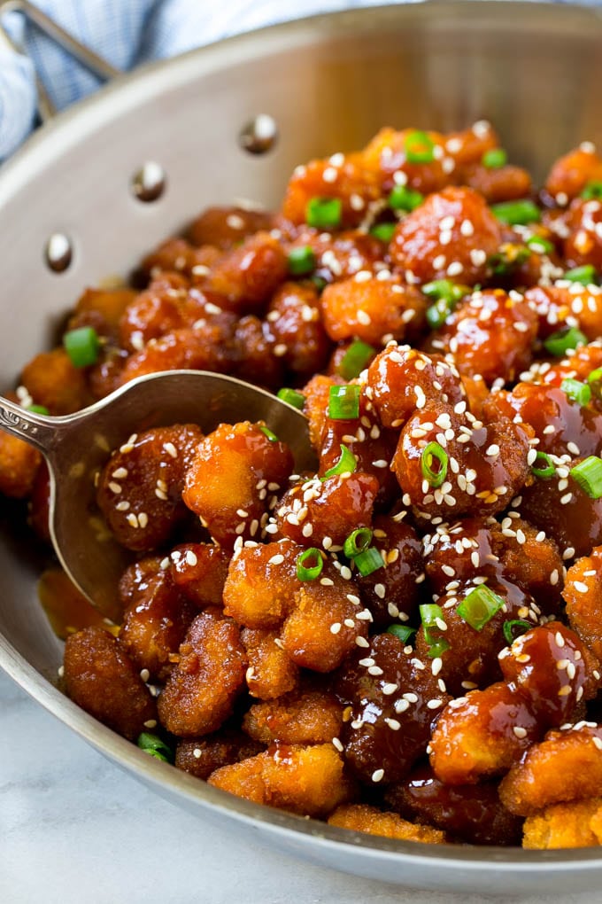 Sesame Shrimp Recipe | Crispy Shrimp | Popcorn Shrimp | Asian Shrimp | Easy Shrimp Recipe #shrimp #fried #friedshrimp #sesameshrimp #crispy #popcornshrimp #chinese #asian #dinner #bajap A pan of crispy sesame shrimp tossed in an Asian style sauce.