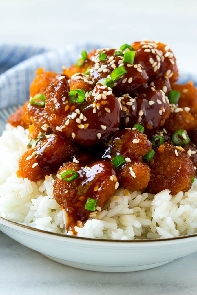 Sesame Shrimp Recipe | Crispy Shrimp | Popcorn Shrimp | Asian Shrimp | Easy Shrimp Recipe #shrimp #fried #friedshrimp #sesameshrimp #crispy #popcornshrimp #chinese #asian #dinner #bajap A bowl of Asian style crispy sesame shrimp over rice.