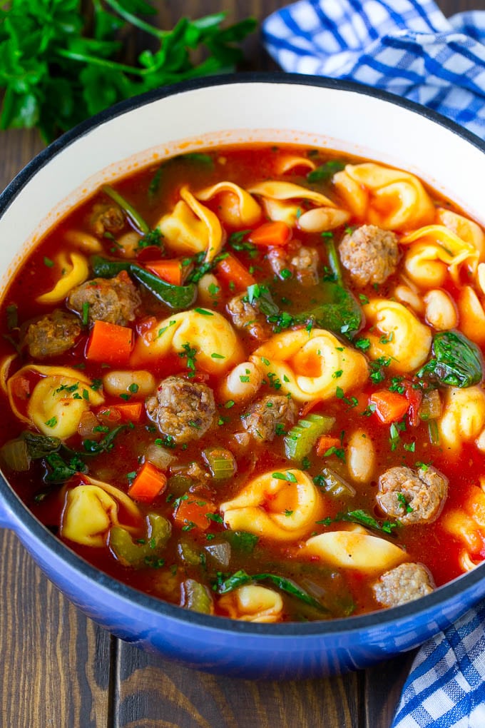 Tortellini Soup Recipe | Sausage Soup | Italian Soup #soup #sausage #pasta #tortellini #dinner #bajap A pot of tortellini soup with tomato broth, Italian sausage, spinach and carrots.
