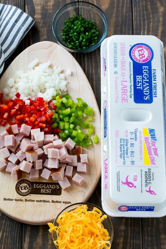 Hash Brown Egg Casserole Recipe | Breakfast Casserole with Ham | Hash Brown Casserole | Ham and Egg Casserole | Egg Casserole with Ham #casserole #breakfast #eggs #egg #hashbrown #bajap Ingredients including eggs, ham, peppers, onions and cheese.