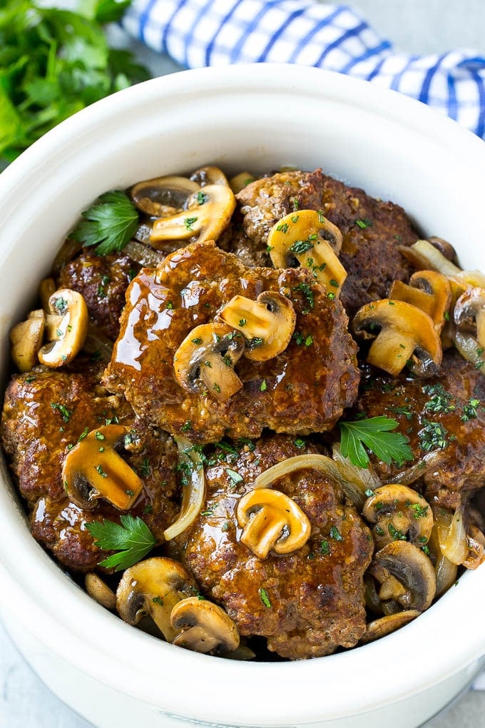 Slow Cooker Salisbury Steak Recipe | Homemade Salisbury Steak | Salisbury Steak from Scratch #steak #beef #salisbury #salisburysteak #slowcooker #crockpot #dinner #bajap Slow cooker salisbury steak with mushroom, gravy and onions.