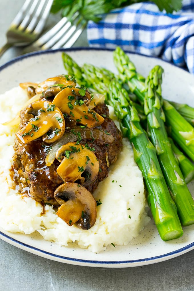 Slow Cooker Salisbury Steak Recipe | Homemade Salisbury Steak | Salisbury Steak from Scratch #steak #beef #salisbury #salisburysteak #slowcooker #crockpot #dinner #bajap Slow cooker salisbury steak with mushroom gravy over mashed potatoes.