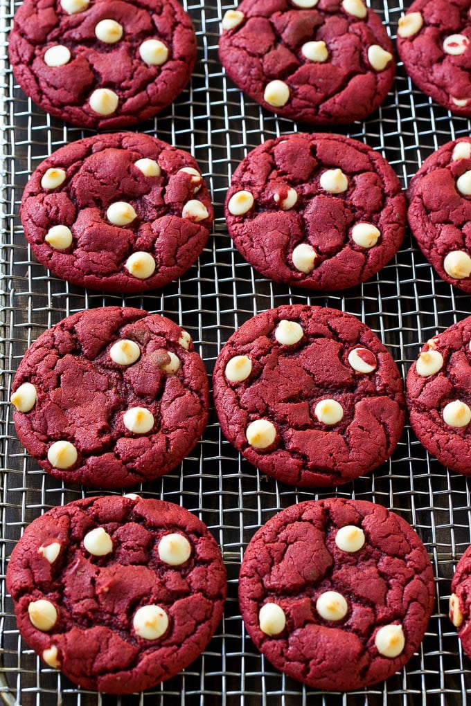 Red Velvet Cookies Recipe | Red Velvet Cookies with White Chocolate Chips | Red Velvet Cake Mix Cookies #redvelvet #cookies #whitechocolate #christmas #bajap Baked cookies on a wire cooling rack.