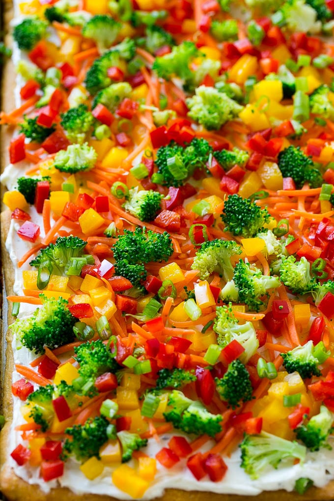 Veggie Pizza Recipe | Crescent Veggie Pizza | Vegetable Pizza Recipe | Holiday Appetizer | Homemade Veggie Pizza #pizza #veggies #vegetarian #appetizer #bajap Veggie pizza on a crescent roll crust with colorful fresh vegetables.
