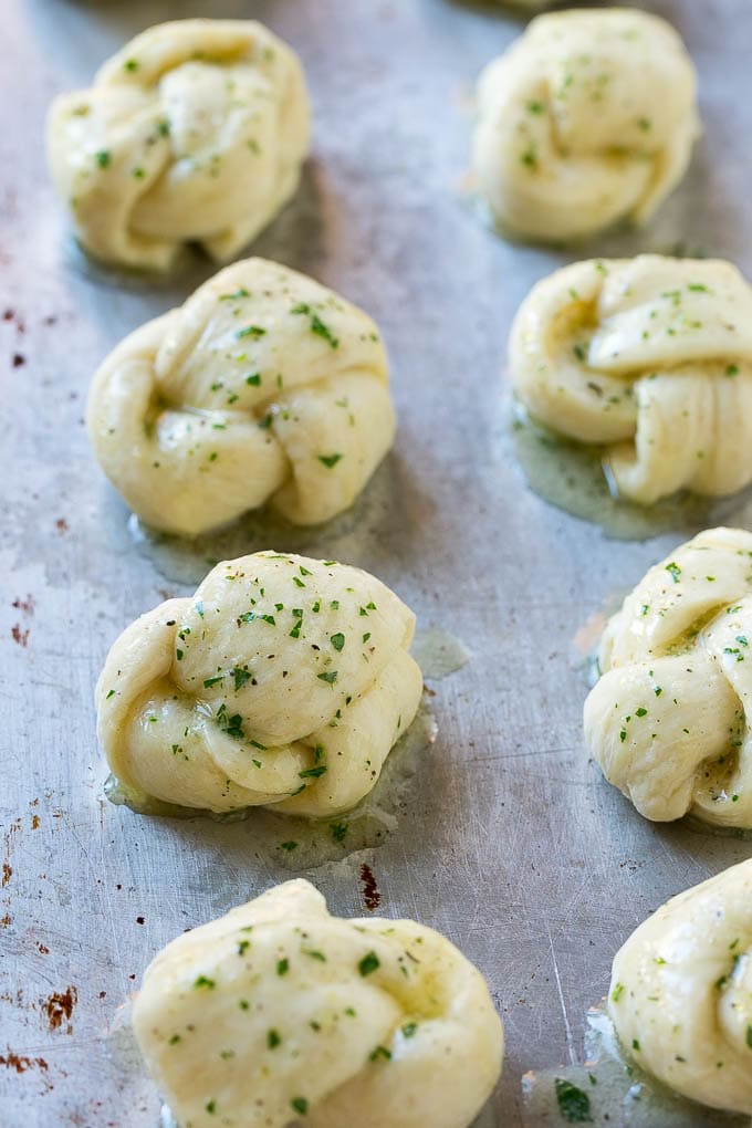 Garlic Knots Recipe | Garlic Rolls | Garlic Butter Rolls | Garlic Bread Recipe #garlic #garlicbread #garlicknots #breadsticks #bajap Dough brushed with butter, herbs and parmesan for extra flavor.