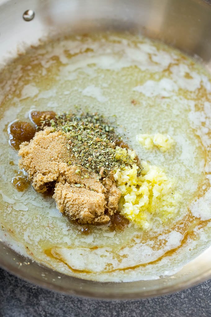 Brown Sugar Pork Chops Recipe | Bone In Pork Chops Recipe | Garlic Butter Pork Chops | Skillet Pork Chops #pork #porkchops #garlic #dinner #glutenfree #bajap Melted butter, brown sugar, herbs and garlic form the sauce for pork chops.