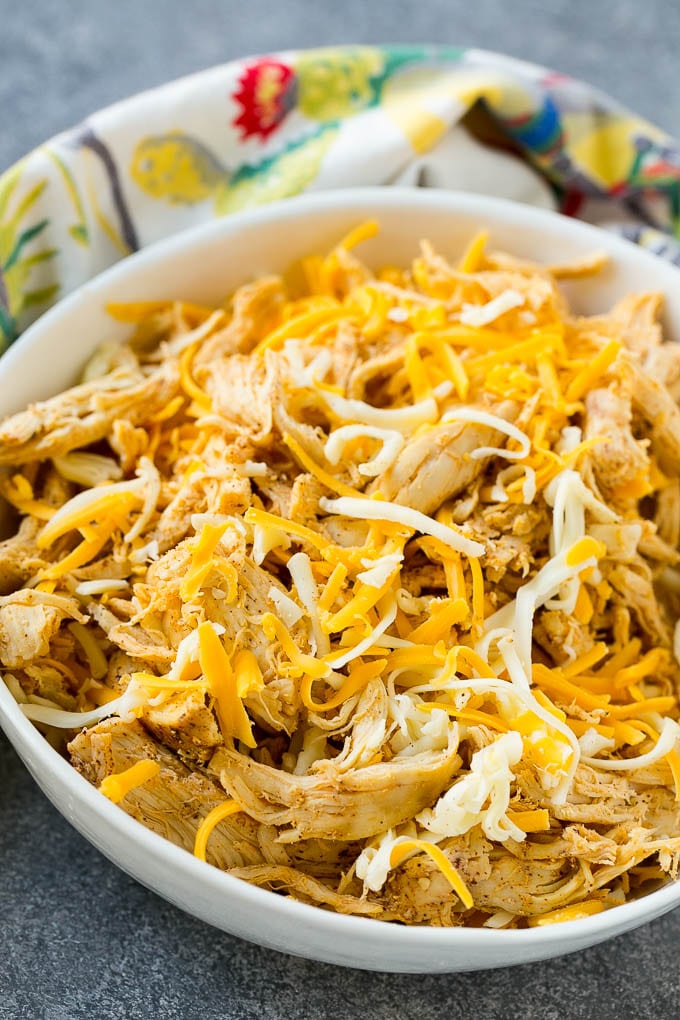 Chicken Taquitos Recipe | Baked Chicken Taquitos | Fried Chicken Taquitos | Mexican Appetizer | Chicken Tortillas #taquitos #chicken #appetizer #tortillas #mexicanfood #bajap A bowl of chicken taquito filling.