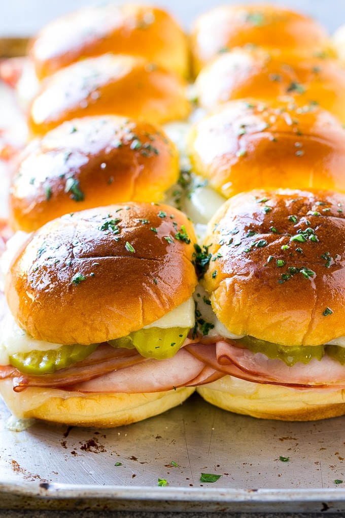 Cuban Sliders Recipe | Cuban Sandwich Recipe | Slider Sandwiches | Ham and Cheese Sliders #sliders #sandwiches #ham #cheese #appetizer #bajap A sheet pan of Cuban slider sandwiches.