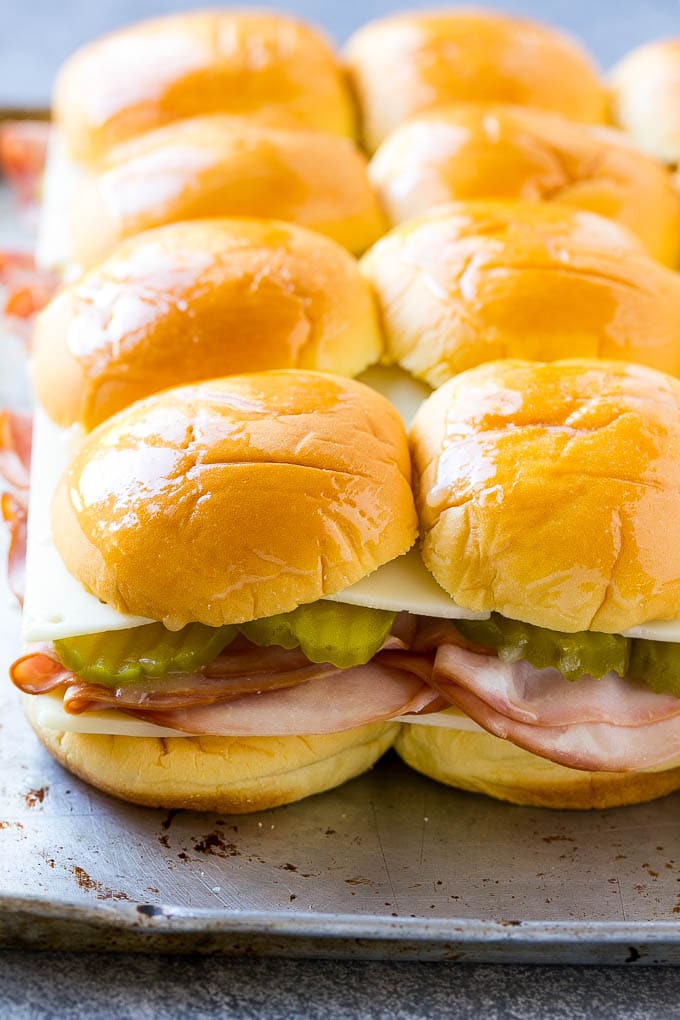 Cuban Sliders Recipe | Cuban Sandwich Recipe | Slider Sandwiches | Ham and Cheese Sliders #sliders #sandwiches #ham #cheese #appetizer #bajap Assembled slider sandwiches ready to go into the oven.