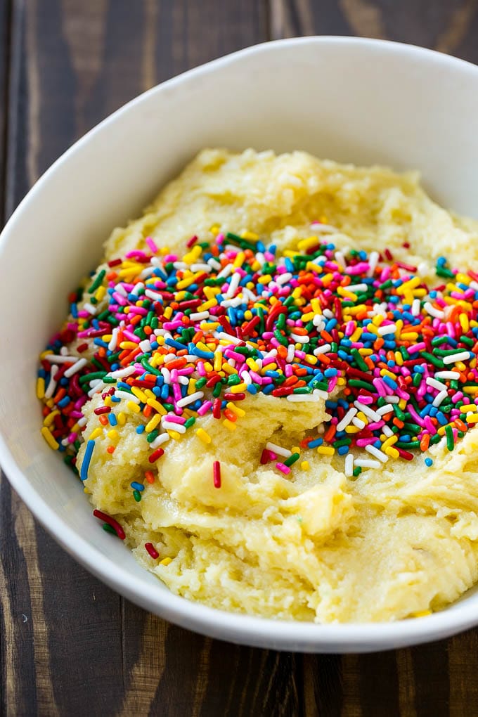 Funfetti Cookies Recipe | Funfetti Cake Mix Cookies | Sprinkle Cookies | Cake Mix Cookies #cookies #funfetti #sprinkles #dessert #bajap Cookie dough in a bowl with sprinkles on top.