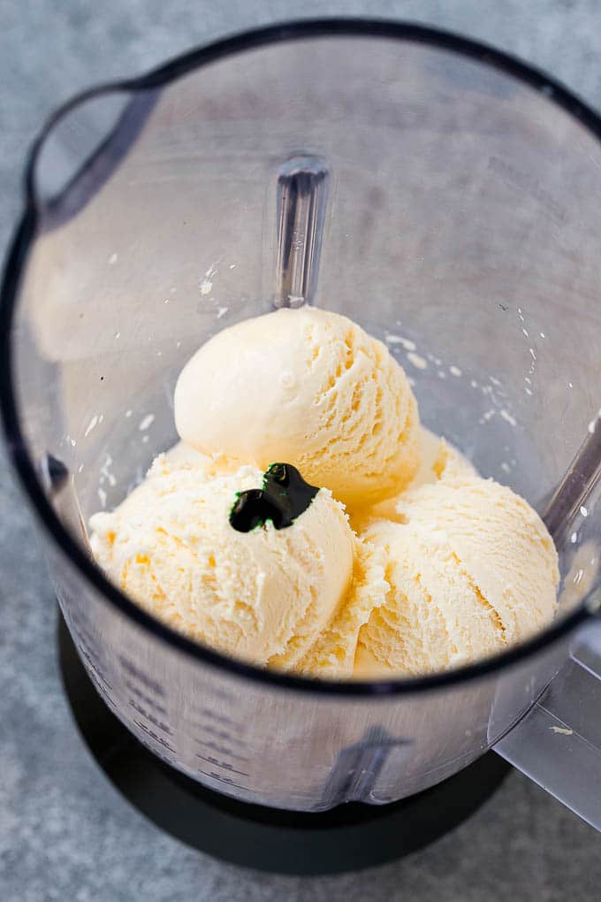 Shamrock Shake Recipe | McDonald's Shamrock Shake | Saint Patrick's Day Drink | Mint Milkshake #milkshake #stpatricksday #saintpatricksday #mint #bajap A blender of vanilla ice cream, milk, mint extract and green food coloring.