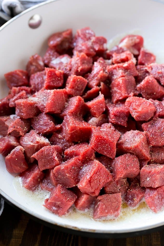 Steak Bites in Garlic Butter Recipe | Garlic Steak | Sirloin Steak Recipe | Steak Appetizer #steak #lowcarb #keto #bajap #dinner Cubes of raw beef seasoned with salt and black pepper.