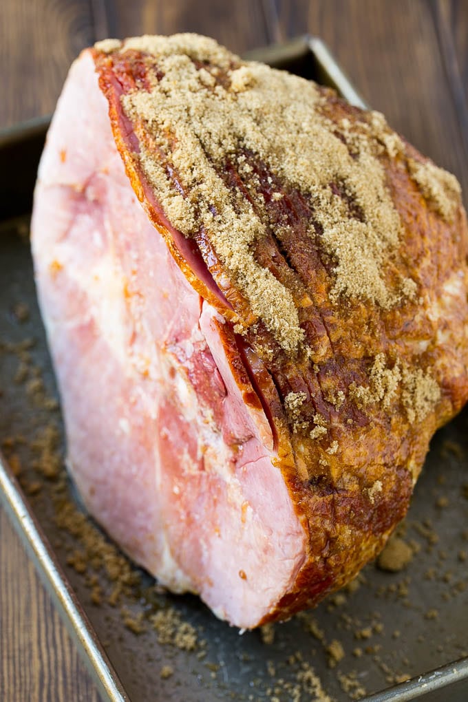 Coca Cola Ham | Coke Glazed Ham | Easter Ham | Christmas Ham | Holiday Ham Recipe #ham #easter #christmas #dinner #bajap A spiral glazed ham coated in brown sugar.
