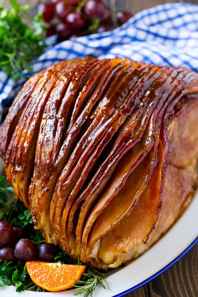 Coca Cola Ham | Coke Glazed Ham | Easter Ham | Christmas Ham | Holiday Ham Recipe #ham #easter #christmas #dinner #bajap A whole spiral cut coca cola ham on a platter.