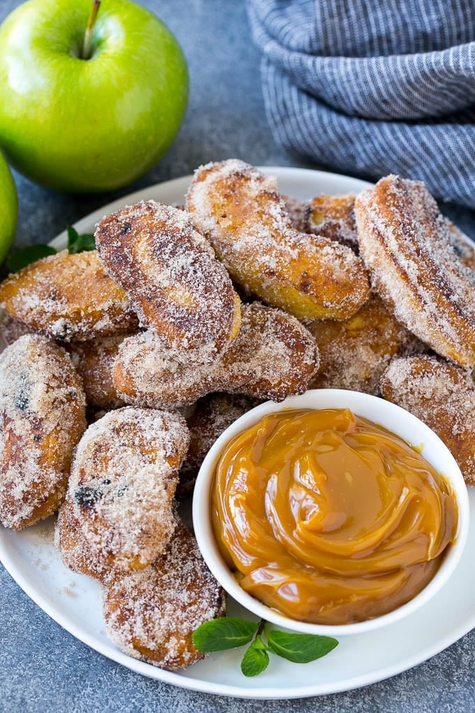 Apple Fries Recipe | Fried Apples Recipe | Cinnamon Sugar Apples | Apple Dessert Recipe #apples #dessert #bajap #fall A pile of cinnamon sugar apple fries with caramel sauce for dipping.
