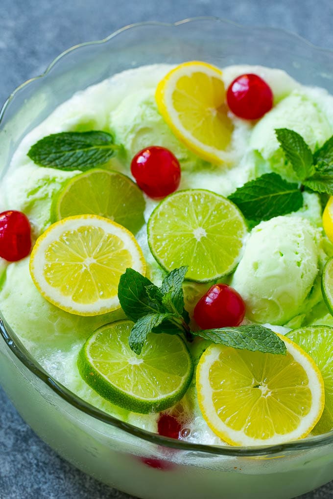 Lime Sherbet Punch | Party Punch Recipe | Sherbet Punch Recipe | Limeade Recipe #sherbet #punch #lime #drink #bajap Sherbet punch garnished with cherries, lemons, limes and mint.
