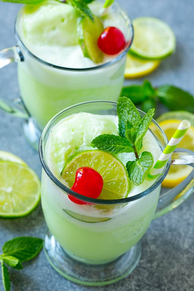 Lime Sherbet Punch | Party Punch Recipe | Sherbet Punch Recipe | Limeade Recipe #sherbet #punch #lime #drink #bajap Cups of sherbet punch with straws.