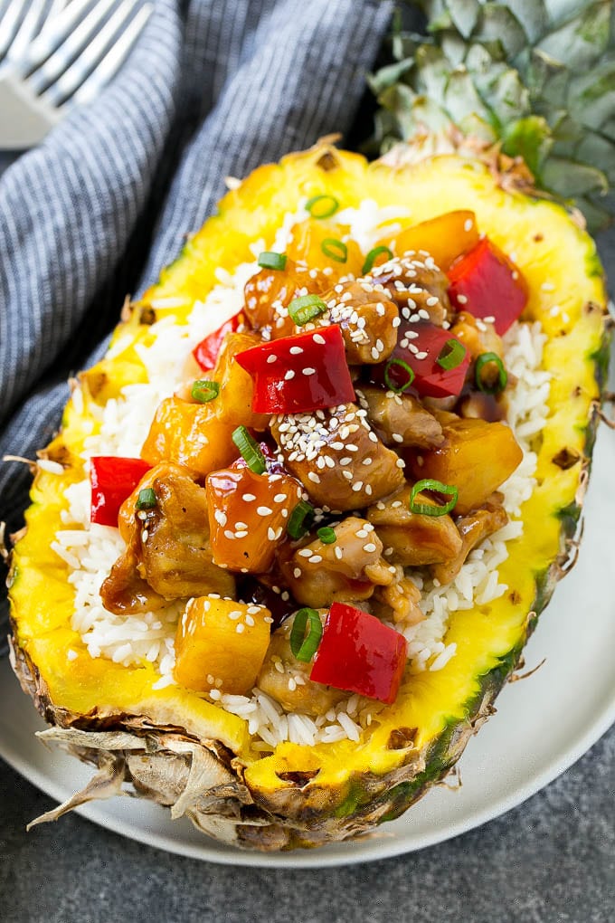 Pineapple Chicken | Hawaiian Chicken | Chicken Stir Fry #pineapple #chicken #dinner #stirfry #bajap Pineapple chicken stir fry over rice served inside half a pineapple.