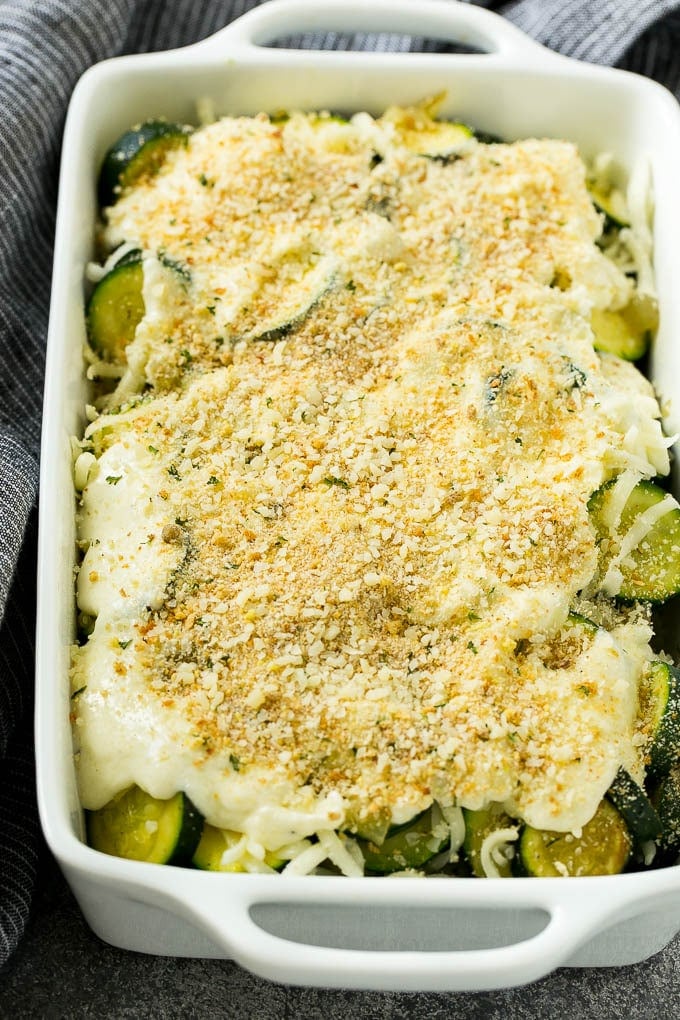 Zucchini Gratin Recipe | Cheesy Zucchini | Baked Zucchini | Easy Zucchini Recipe #zucchini #casserole #cheese #dinner #sidedish #bajap Zucchini gratin with layers of cheese, sauce and breadcrumbs, ready to go into the oven.